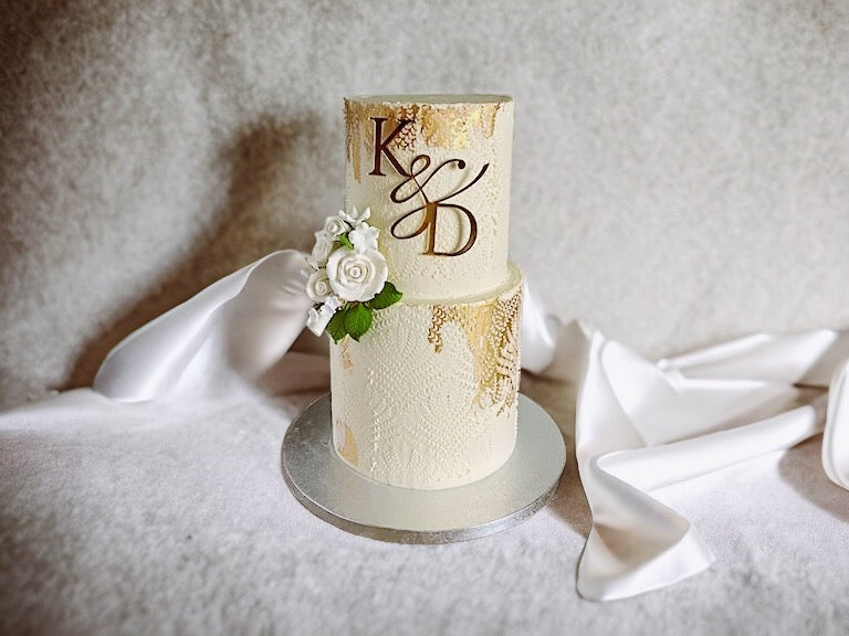 Ivory cake with Gold Leaf, sugar flowers and Texture
